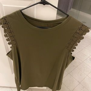 Women’s tank with cute fringe on sleeve. Size XL, slimmer fit.